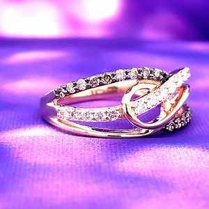 Play with neutrals with this fun right-hand ring from LeVian! This twisted band from the Le Vian Creme Brulee® collection, features a row of .30ct Nude Diamonds™ intertwined with a row of .25ct Chocolate Diamonds®. Absolutely beautiful! Stop in and see more from this collection at our LeVian Trunk Show on April 28! Link to ring on our website: https://www.emsmithjewelers.com/jewelry-details/diamond-fashion-rings/14k-strawberry-gold-le-vian-creme-brulee-fashion-ring/49149 | E.M. Smith Family Jewe