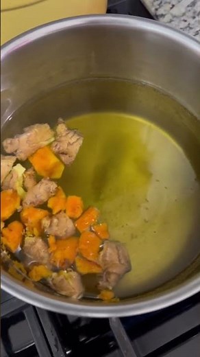 Boiling ginger and turmeric