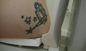 Tattooed girl toilet explosion