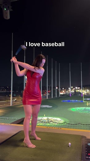hottie playing golf in a mini dress