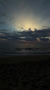 Beach Ocean Sunset: Calm Sea Scenery at Dusk