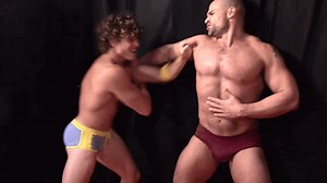 Gay Pro Wrestling Superstar SCRAPPY McNAIR Gut Punching a Beefy Hunk from MuscleboyWrestling.com GAY PRO WRESTLING | All World Pro Wrestling