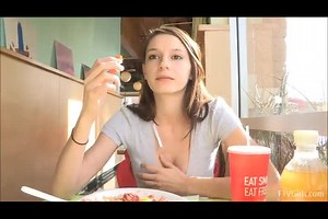 Pretty Brunette Babe Flashing Her Boobs While She Eats In Restaurant