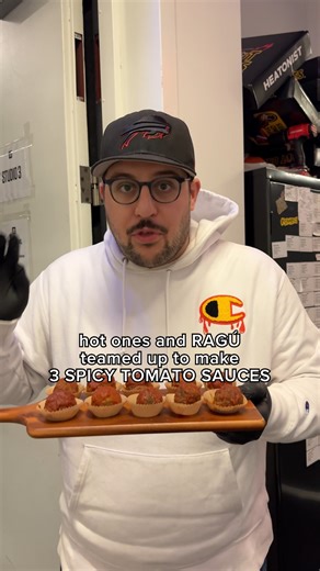 Hot ➡️ Hotter ➡️ Hottest 🥵 We put our team to the test with Hot Ones x RAGÚ Heat Pack Roulette! Try all the flavors at home with your very own limited edition Heat Pack of spicy cooking sauces: raguxhotones.com. | First We Feast