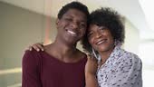 Portrait of grandmother and grandson at home