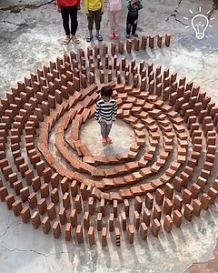 A domino masterpiece with bricks! | Dr Shauwn Mkhize - Mamkhize