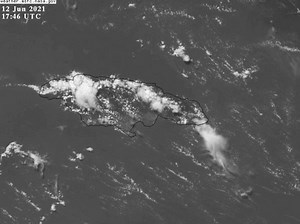 This afternoon's close-up satellite image currently indicates clouds contributing to overcast skies, isolated showers and thunderstorms across sections of some northern parishes in Jamaica. | Weather Jamaica