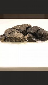 At least 5000 years old, this loaf of bread is attributed to the early Bronze Age of central Anatolia and was discovered at the Küllüoba Mound in modern-day Turkey. It is a fully preserved, baked and fermented piece of bread, tube-shaped and measuring 2.5 cm in thickness and 12.5 cm in width. Microscopic plant residues known as phytoliths were identified on its surface, suggesting fermentation during preparation. This artifact is now housed and displayed in Eskişehir, Turkey. It was unearthed by