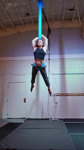 Mesmerizing Aerial Hammock Tricks by Elaina