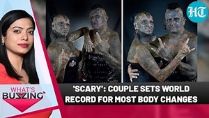 Couple sets record with nearly 100 body modifications | WHAT'S BUZZING