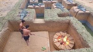 Accusation that most of the 'videos of building a house in a primitive way' are fake