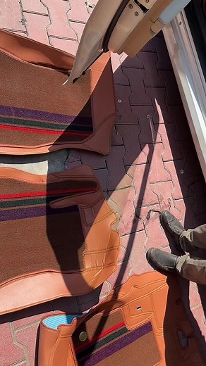 Close-Up of Car Interior Featuring Leather Door Panels