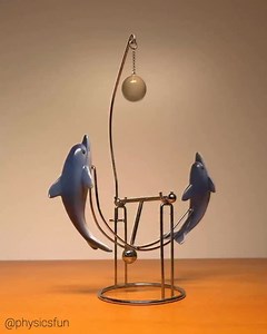 19K views · 216 reactions | Kinetic Dolphin Desk Toy: a vintage...