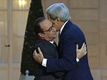 John Kerry awkwardly hugs French President Francois Hollande | Daily Mail Online