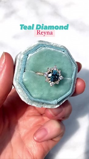 Teal diamond Reyna is super rare, super saturated, and beyond hypnotic. There is only ONE left in this size and it’s on sale. Are you ready to finally make this ring yours?This midsize style is ready to ship in 14K yellow gold and features a 1.62ct teal-blue-green diamond center stone. Lab-grown, conflict-free, and as ethical as it is sparkling. Reyna is a vintage-inspired halo engagement ring that makes a beautiful heirloom piece, designed to be passed down for generations. #tealdiamondring #bl