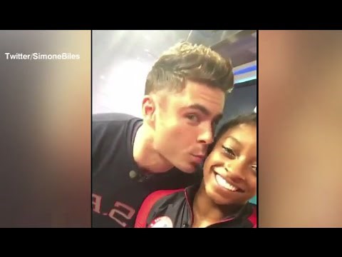 Simone Biles Gets Kiss From Zac Efron