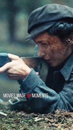 A female machine gunner who still holds the trigger after her death. | Santos Baird