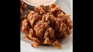 5.2K views · 47 reactions | These easy Blooming Onions are double-coated with a flavorful breading and deep-fried to golden perfection. They are much better than Outbacks and so easy to make at home. | Small Town Woman | Facebook