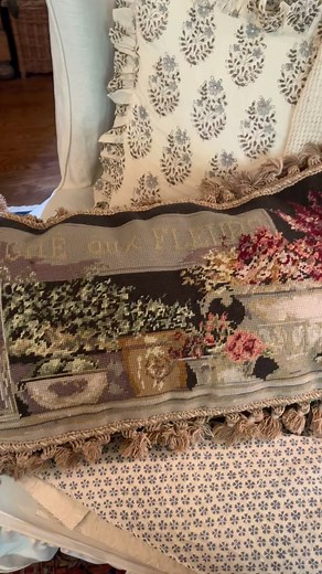 The most charming needlepoint pillow featuring French flowers . . . photographed against several backgrounds so that its stunning colors can be appreciated. Available at both store locations. #frenchflowers }cottagecharm | High Country Cottage