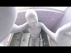 Silver zentai in Bathtub