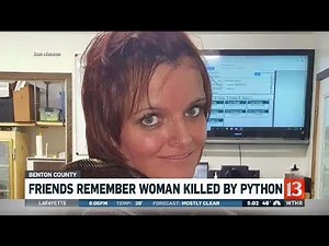 Python strangles woman