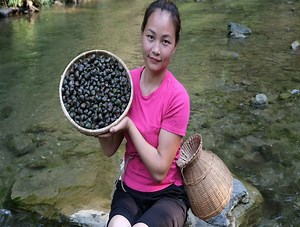 1.9K views · 115 reactions | Catch snails in the stream, Cook fried snails with lemongrass and chili - grow watermelon | Capi Solo Bushcraft | Facebook