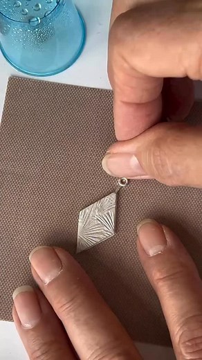 SILVER METAL CLAY >> 3 things you need to know about adding embeddable eyelets / jump rings 1. Make sure your piece is thick enough to take an embeddable 2. Push it deep into the wet clay so the jump ring is sitting in the clay 3. Turn over your piece to make sure it’s sitting inside the clay and hasn’t just slid along the back! TOP TIP >> if your piece has lifted off the mat, you may find that you need to tap it down so that the tab doesn’t slip down the back and not embed itself in the clay. I