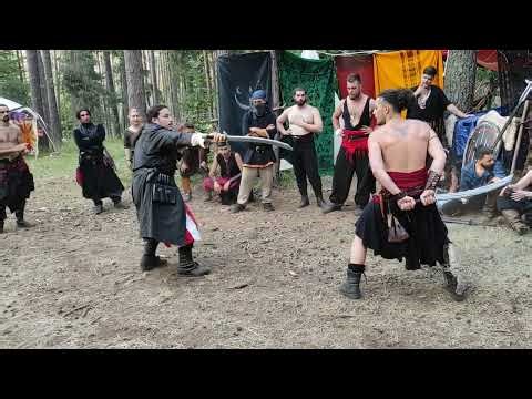 Nude barbarian vs armor fighter, scimitar medieval larp fight