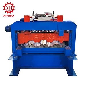 [Hot Item] The Main Function Is to Cut Large Steel Coils Into Steel Strips or Sheets of Different Sizes by Precisely Controlling of Decking Panel Roll Forming Machine