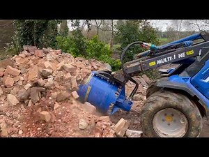 The Cone Crusher Bucket used on a Multi One mini loader