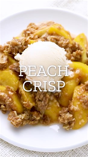 Golden, juicy peaches topped with a buttery, crunchy crumble! 🍑✨ This Peach Crisp is the perfect comfort dessert, bursting with sweet, summery flavors. Serve it warm with a scoop of vanilla ice cream! https://bakeorbreak.com/2022/06/peach-crisp/ | Bake or Break