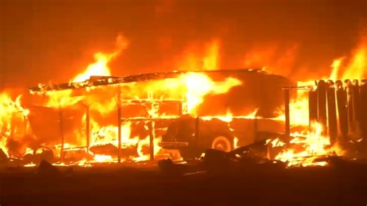 Thousands evacuated as fire burns