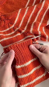 The Tubular Bind Off is a super stretchy bind off technique that’s ideal for k1-p1 ribbing, brioche, or double knitting. Plus it perfectly matches the Tubular (aka Italian) Cast On that I used on the collar of this top-down sweater. If you’ve ever grafted the toe on a cuff-down sock, this is going to look very familiar. The Tubular Bind Off essentially grafts the knit stitches to the purl stitches, except that here, unlike the toe of a sock, all your stitches are sitting on a single knitting nee