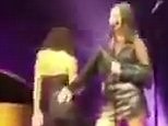 Woman down! Lana Del Rey dancer FALLS after singer pats her butt | Daily Mail Online