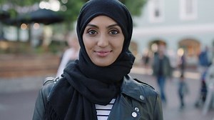 clip-1007534734-portrait-young-pretty-middle-eastern-woman-smiling