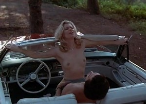 Kate Vernon has sex in car in the forest