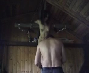 vintage crucified in the barn