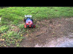 Team Associated rc8.2e!! 20 foot road clearing jump!!