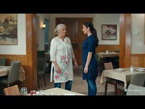 Lesbian kiss between two lesbians in a cafe