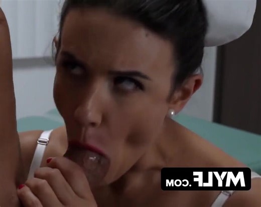 A stunning, well-endowed nurse, reminiscent of the character Ratched, administers an intense oral service to a patient – a scene parodying a film. Sexvideo