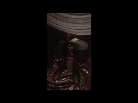 Peeing and oil in my leather legging (with boot and raincoat hidden)