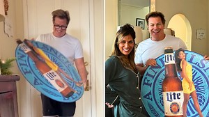 Dad surprised with beer model wife's tin tacker after decades of searching