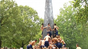 Naval Academy students cap Herndon Monument