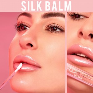 60K views · 224 reactions | SILK BALM✨ The ultimate hydrating lip balm which gives you the shine of a gloss, the comfort of a balm with a plumping effect  This universal shade is designed to look gorgeous on everyone  | Huda Beauty | Facebook