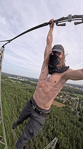 Living life between wires and clouds #pylon #tower #parkour #powerlines #hanging #adrenalinejunkie | Irun Grid