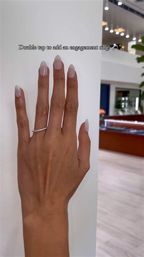 Double-tap to add an engagement ring to your feed, but visit the Diamond District to see one shine in person! 🤭 💫 | Diamond District