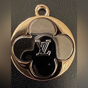 Gorgeous Louis Vuitton Black and Gold Clover Zipper Pull!