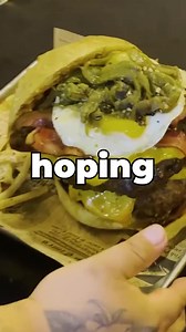 The 50/50 Belly Buster Double Cheeseburger Challenge hosted by Hollow Spirits Distillery in Albuquerque, New Mexico!! There were two giant 2lb 50/50 #burger patties stacked and layered with cheese slices, bacon strips, fried eggs, and lots of #NewMexican Hatch green chilies!! I had 1 hour to finish the #hamburger with a side of fries to win my meal free, a sweet T-shirt, and the 2nd spot on the Wall of Fame!! #burgers #beef #bacon #hollowspirits #cheese #Albuquerque #newmexico #greenchilies #cha