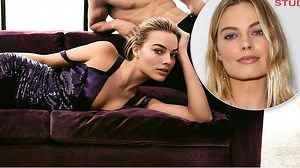 Margot goes braless in mini dress