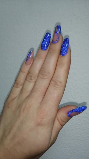 Vibrant Blue Glitter Nail Art Showcase